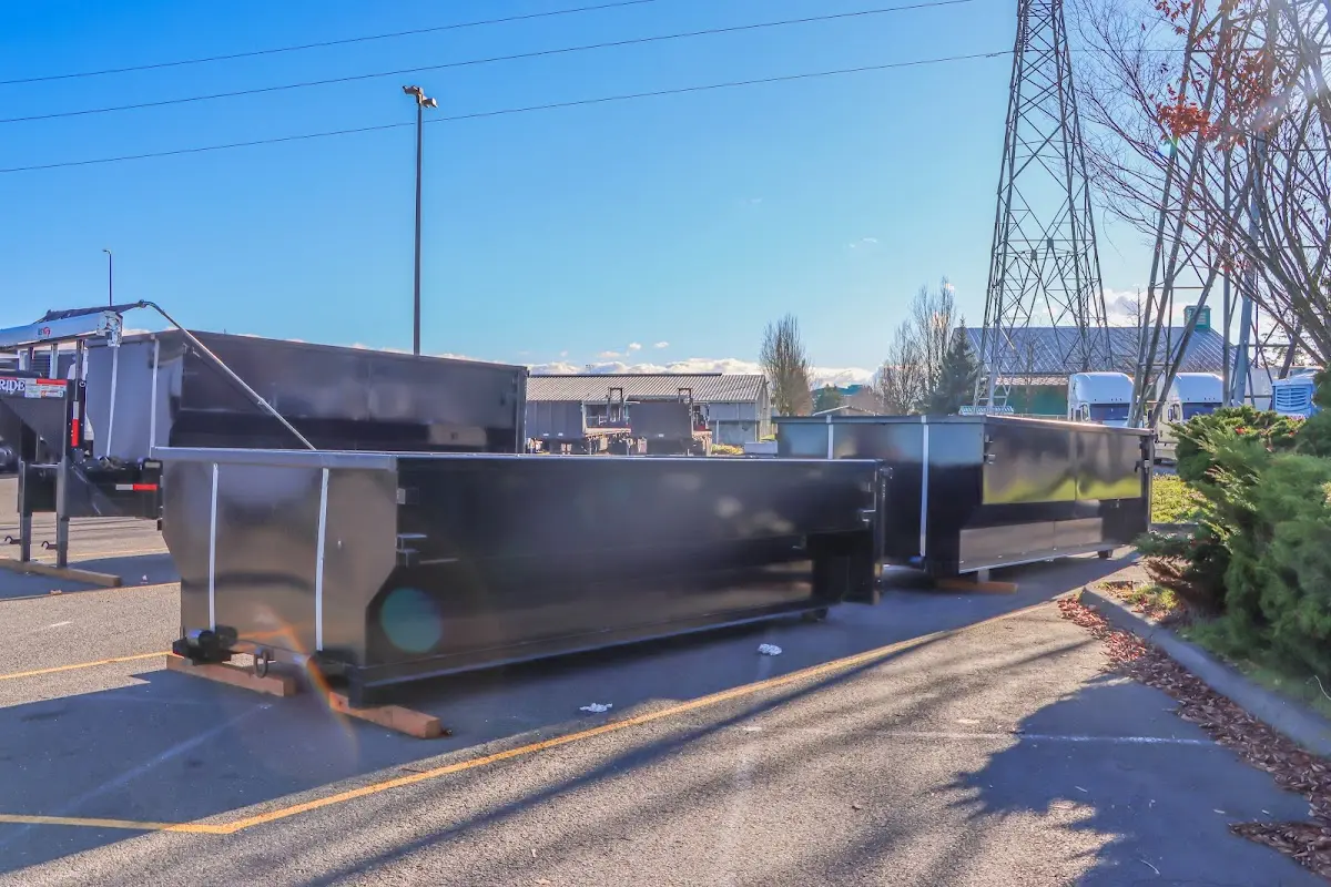 Roll-off dumpster ready for waste disposal at job site for 3 Yard Dumpster Rental in Emporia